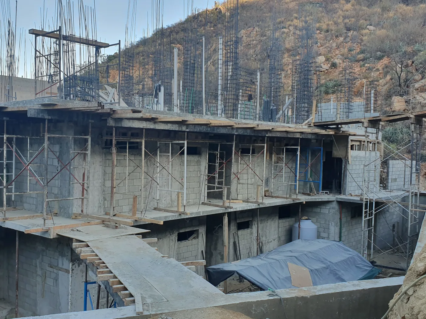 Concrete floors and columns rising during construction