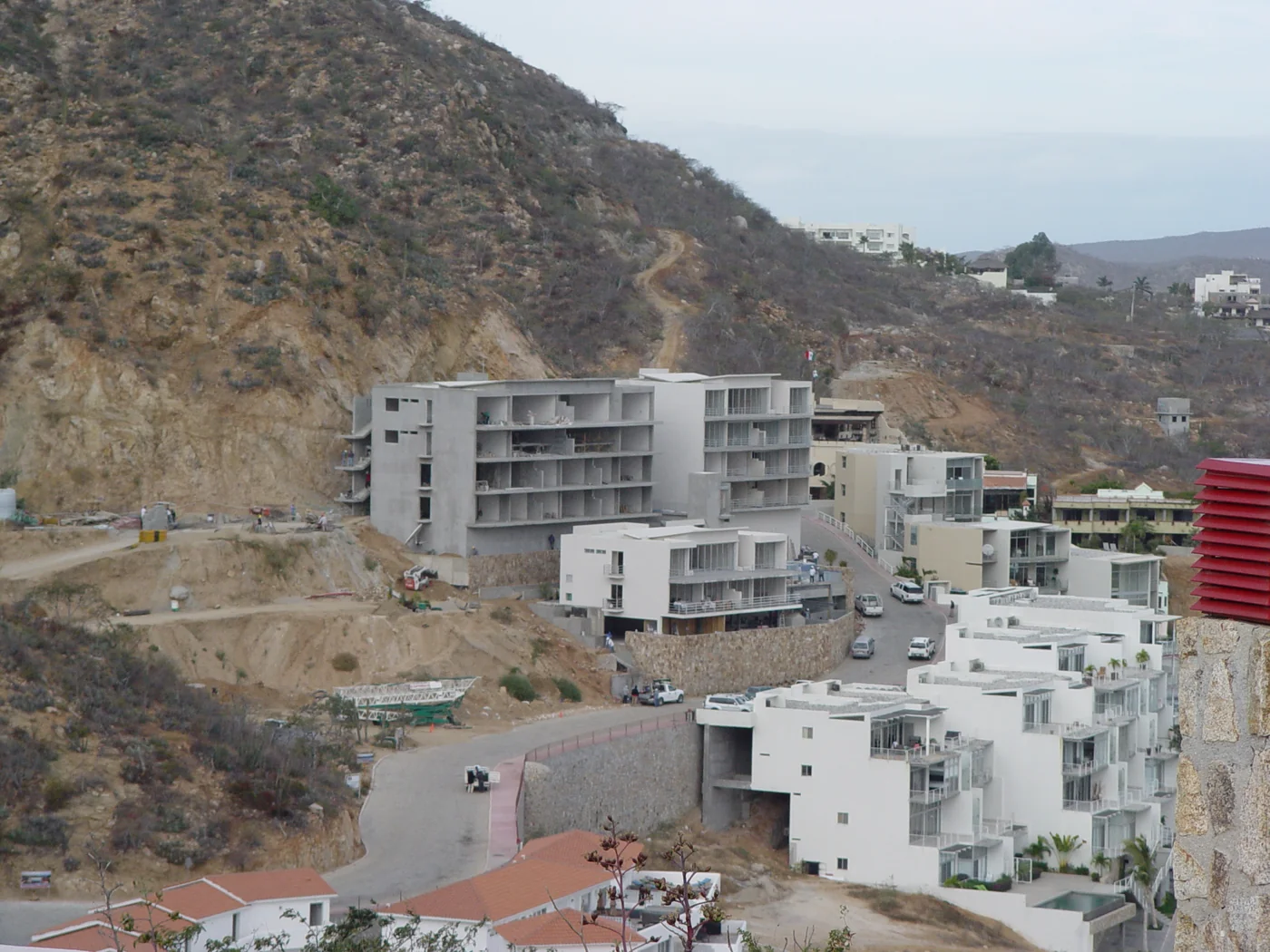 Early Las Cascadas buildings and hillside roads during construction